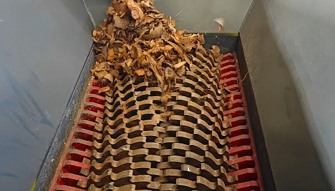 Double shaft shredder used for coconut shells